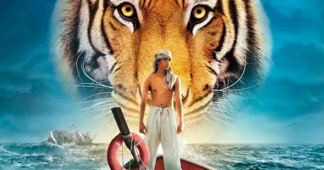 Affiche du film avec un enfant sur une barque et un tigre en arrière-fond